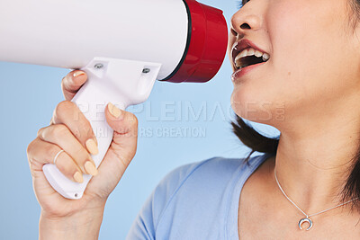 Buy stock photo Woman, megaphone and shout for protest, closeup and studio for freedom, justice or peace by blue background. Girl, student activist and loudspeaker for speech, presentation or human rights with audio
