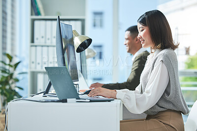Buy stock photo Business, planning and asian woman on laptop and computer in office for research or strategy in coworking space. Online, search and happy female designer smile for creative, networking or design