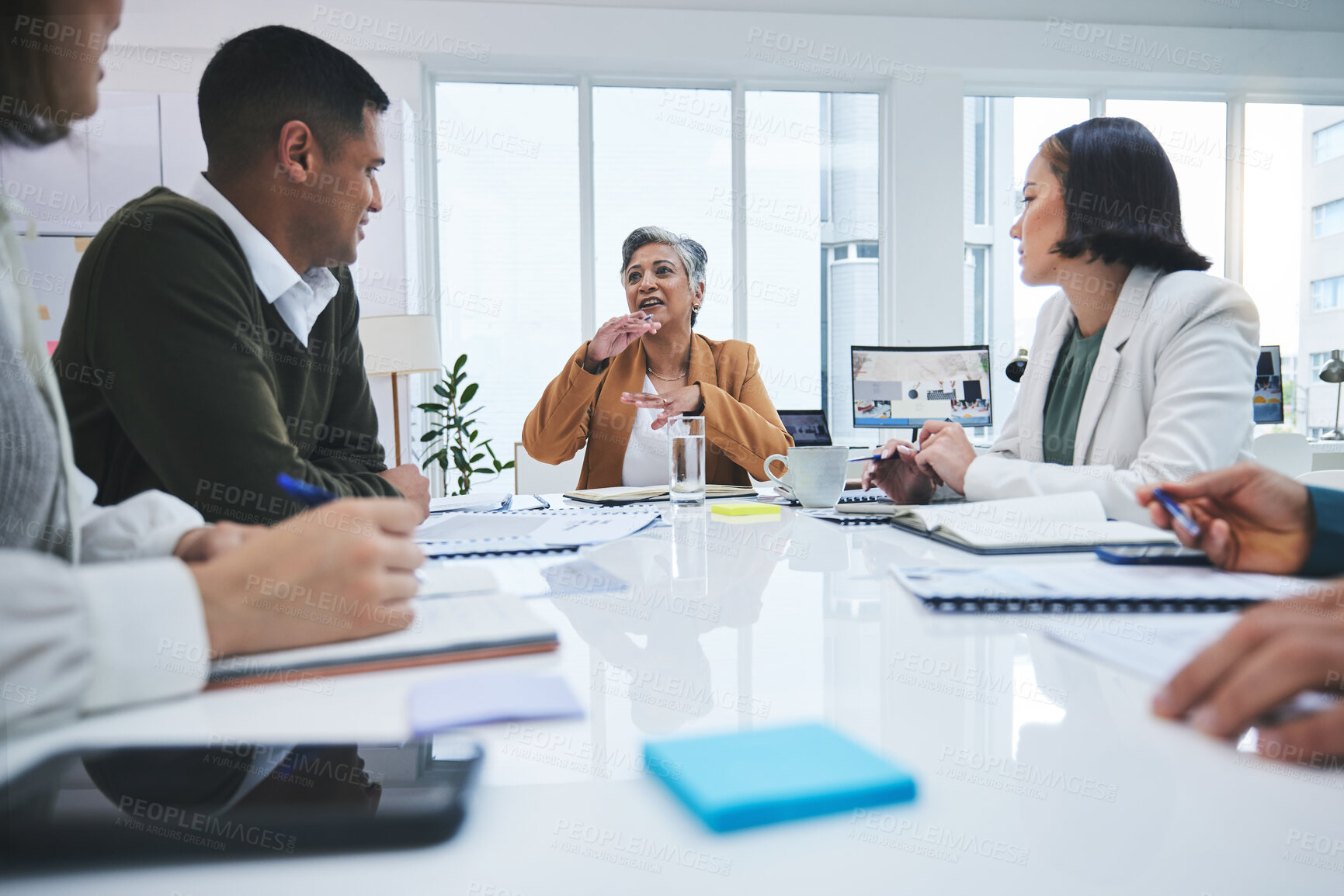 Buy stock photo CEO, woman speaking or business people in meeting planning in discussion with mission together. Collaboration, leadership or mature mentor talking about project ideas in agency to team of employees