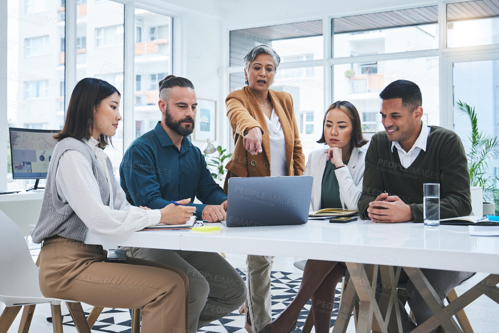 Buy stock photo Laptop, woman or business people for teamwork, problem solving in discussion of solution or mission. Computer, leadership or mature mentor talking or pointing to project ideas or advice for employees