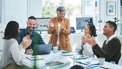 Buy stock photo Happy business people in meeting at desk with applause, cheers and celebration of sales target achievement. Clapping, praise and congratulations with success, motivation for men and women in office.