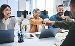 Creative people, fist bump and meeting in teamwork, success or achievement together at office. Group of employees touching hands in startup project, winning or team building promotion at workplace