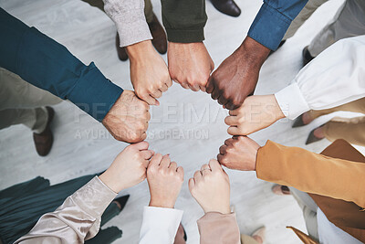 Buy stock photo Hands, fist bump and team, support with solidarity and business people with top view and community. Synergy, cooperation and huddle, collaboration and corporate group with trust, meeting and mission