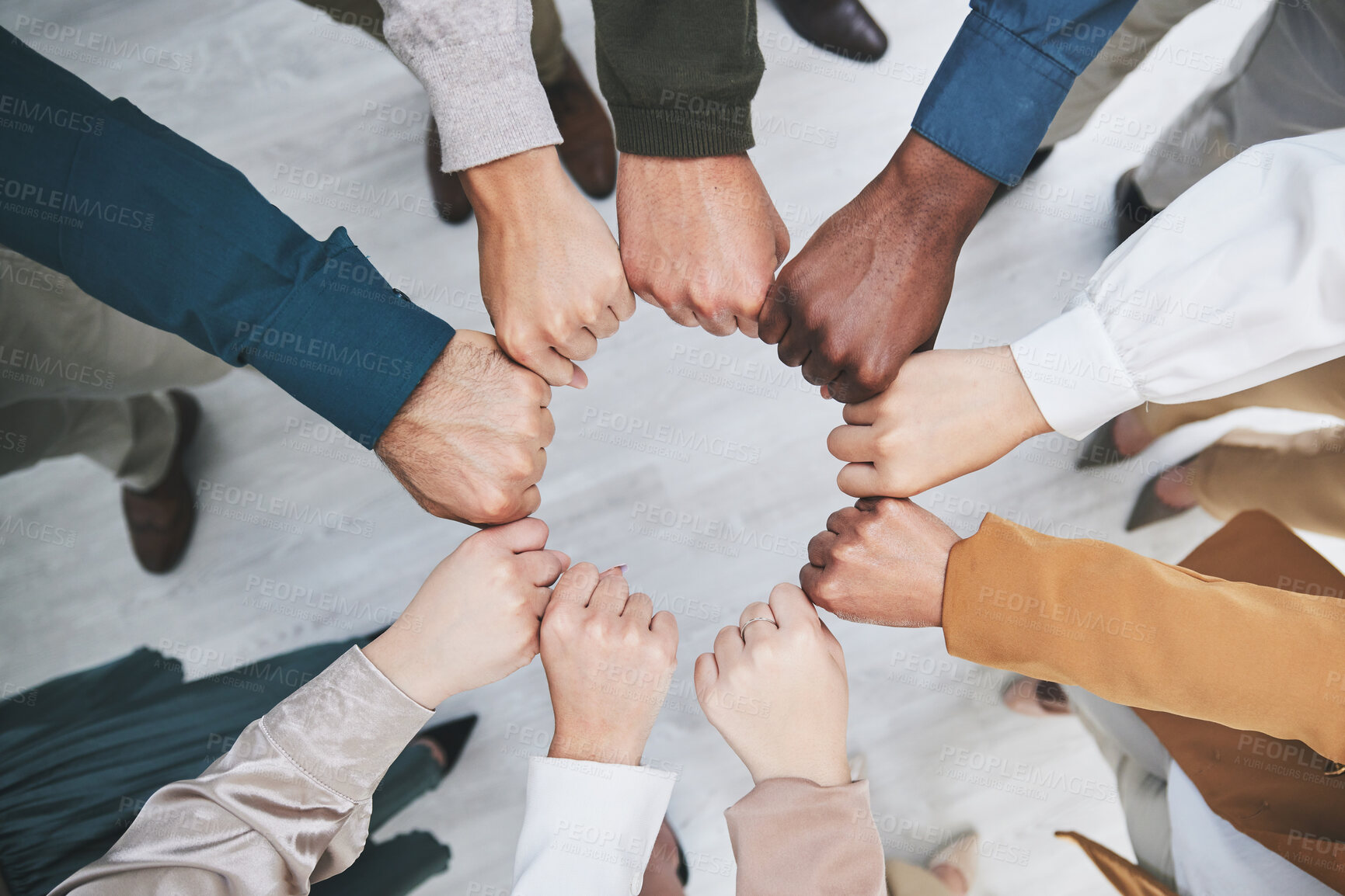 Buy stock photo Hands, fist bump and team, support with solidarity and business people with top view and community. Synergy, cooperation and huddle, collaboration and corporate group with trust, meeting and mission