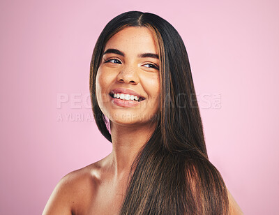 Buy stock photo Smile, hair care and woman with texture, growth and wellness on a pink studio background. Luxury, happy person and female with volume, aesthetic and dermatology with makeup, skincare and healthy skin