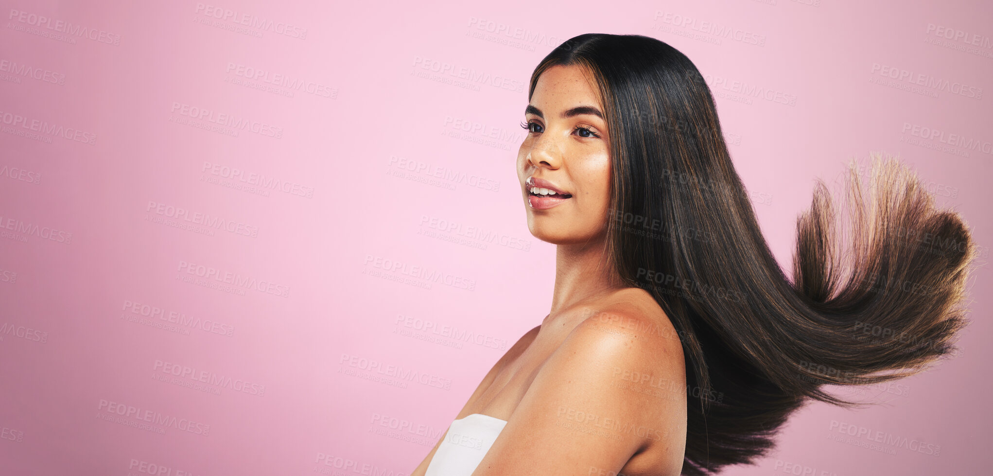 Buy stock photo Hair, beauty and woman in studio with mockup for texture, treatment or shine on pink background. Haircare, glow and model profile with healthy growth, results or strand strength, keratin or cosmetics