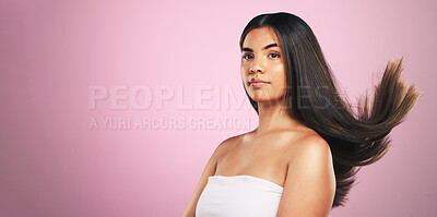 Buy stock photo Beauty, hair and woman in studio with mockup for texture, treatment or shine on pink background. Haircare, glow and female model with healthy growth, results and strand strength, keratin or cosmetics