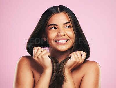 Buy stock photo Beauty, hair and happy woman in studio for cosmetic, shampoo and results, treatment or satisfaction on pink background. Haircare, smile and female model with strand strength, growth or smooth texture