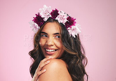 Buy stock photo Happy woman, flowers and thinking with crown in studio for natural beauty, skincare and plants on pink background. Face, model and floral wreath for sustainability, eco dermatology and hair cosmetics