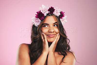 Buy stock photo Beauty, flowers and crown on hair of woman in studio for cosmetics, skincare and wellness. Self care, spa treatment and plant with face of person on pink background for spring, glow and makeup 