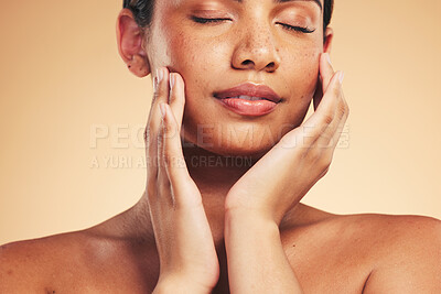 Buy stock photo Skincare, beauty and natural face of woman with hands for wellness, health and facial care in studio. Dermatology, spa and eyes closed of person on brown background in cosmetics, glow or satisfaction