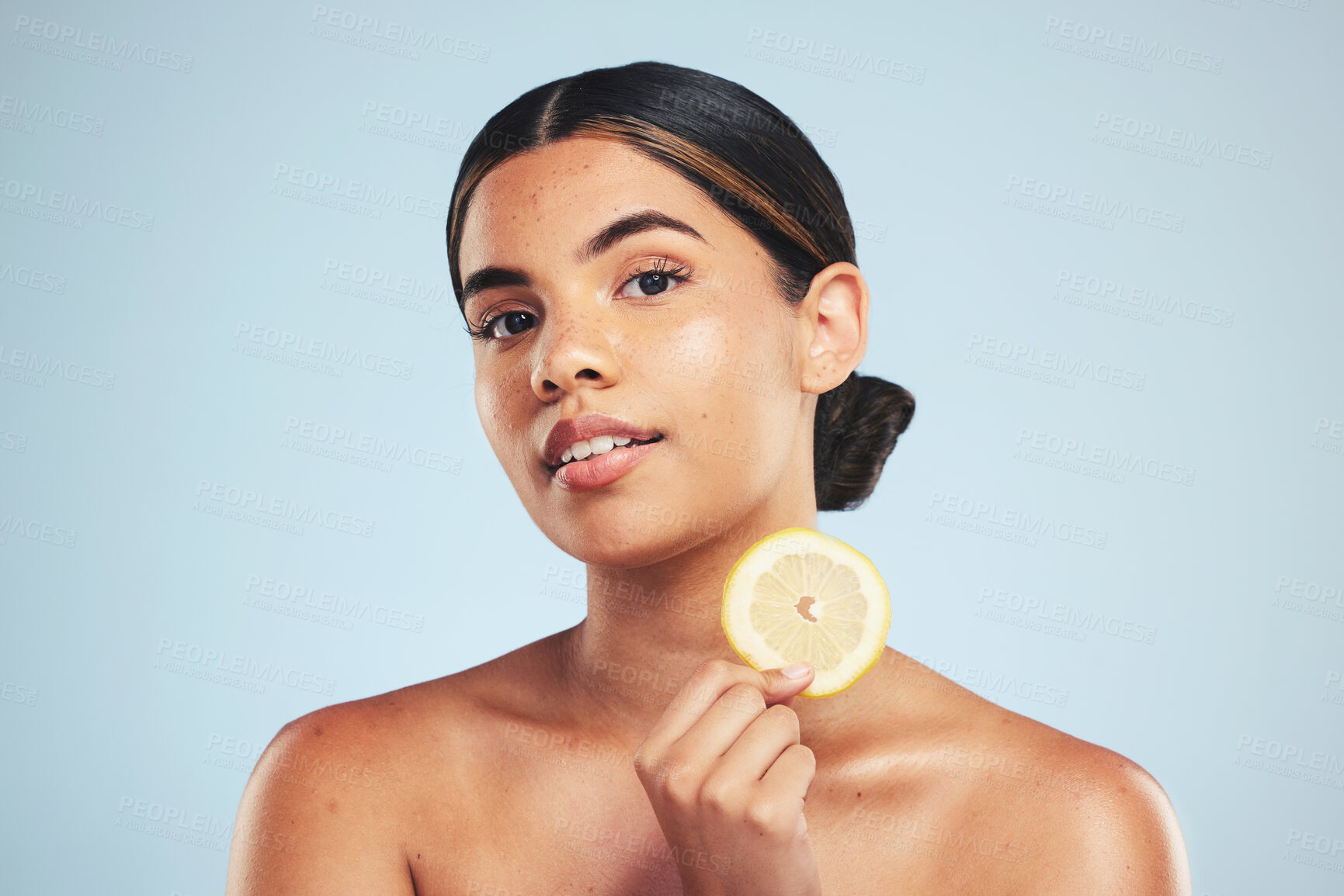 Buy stock photo Portrait, woman and lemon in studio for skincare, wellness and organic cosmetics on grey background. Fruit, slice and face of model with citrus treatment for vitamin c, collagen and anti aging detox