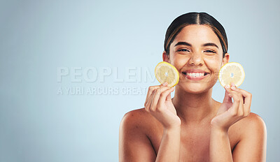 Buy stock photo Lemon, skincare and woman portrait in studio for vitamin C, wellness or organic, beauty or detox on grey background, Fruit, face and model smile for citrus facial, collagen or anti aging dermatology