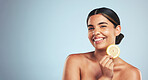 Portrait, lemon and happy woman in studio for skincare, wellness or organic, beauty or skin detox on grey background, Fruit, smile and face of lady model with citrus facial for collagen or anti aging