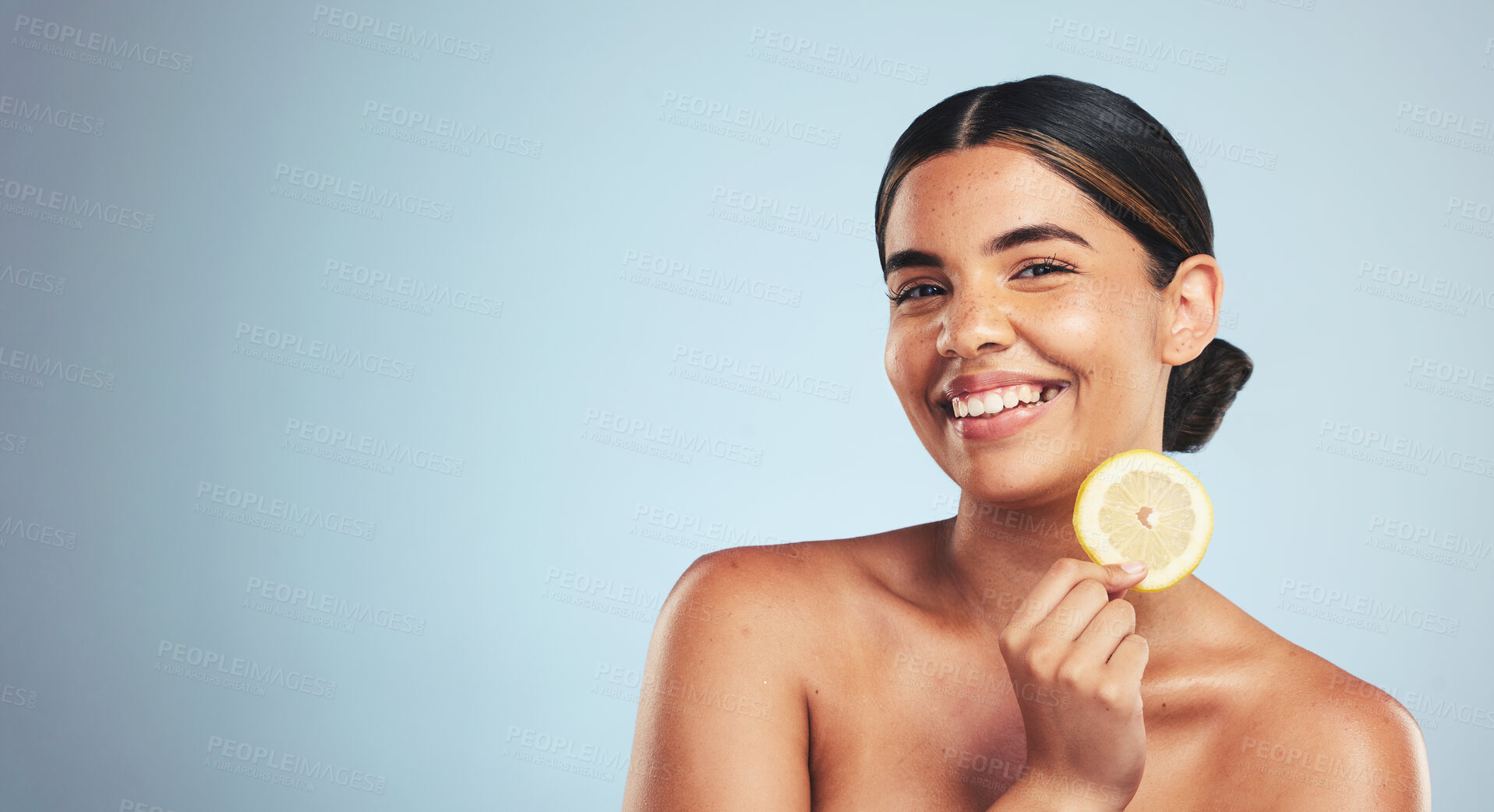 Buy stock photo Portrait, lemon and happy woman in studio for skincare, wellness or organic, beauty or skin detox on grey background, Fruit, smile and face of lady model with citrus facial for collagen or anti aging