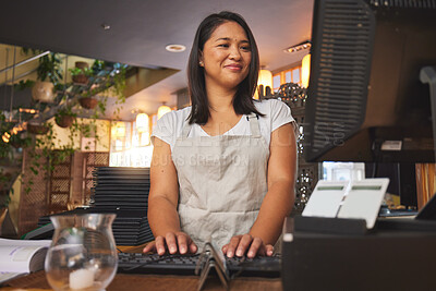 Buy stock photo Restaurant, computer and woman typing order for food service, manage inventory and check sales. Coffee shop, small business and happy waitress, barista or manager by counter on pc for cafe website