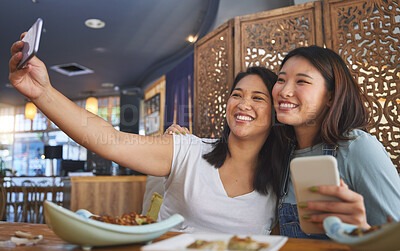 Buy stock photo Selfie, lgbt and a gay couple in an asian restaurant for a romantic date together on an anniversary. Lesbian, smile and happy asian woman with her partner in a cafe for eating or celebration of love