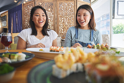 Buy stock photo Happy women friends, sushi restaurant and eating with surprise, comic laugh, catering and plate. Japanese students, wow and excited with fish, seafood and diner with nutrition, hungry and thinking