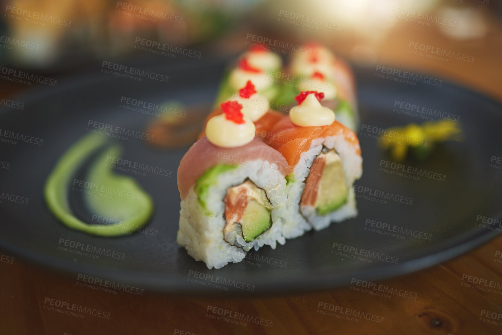 Buy stock photo Sushi restaurant, catering and plate in closeup for service, lunch and dinner for Philadelphia roll, chopsticks and fish. Japanese cuisine, platter and food in cafe, luxury and eating for nutrition