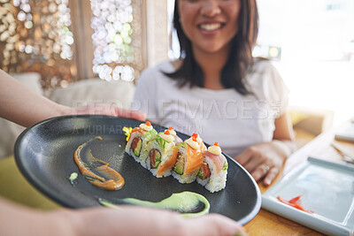 Buy stock photo Sushi plate, restaurant and hands of person, server or waiter with food choice, order or lunch for diner service. Hospitality industry, Japanese cuisine and cafeteria worker with meal for customer