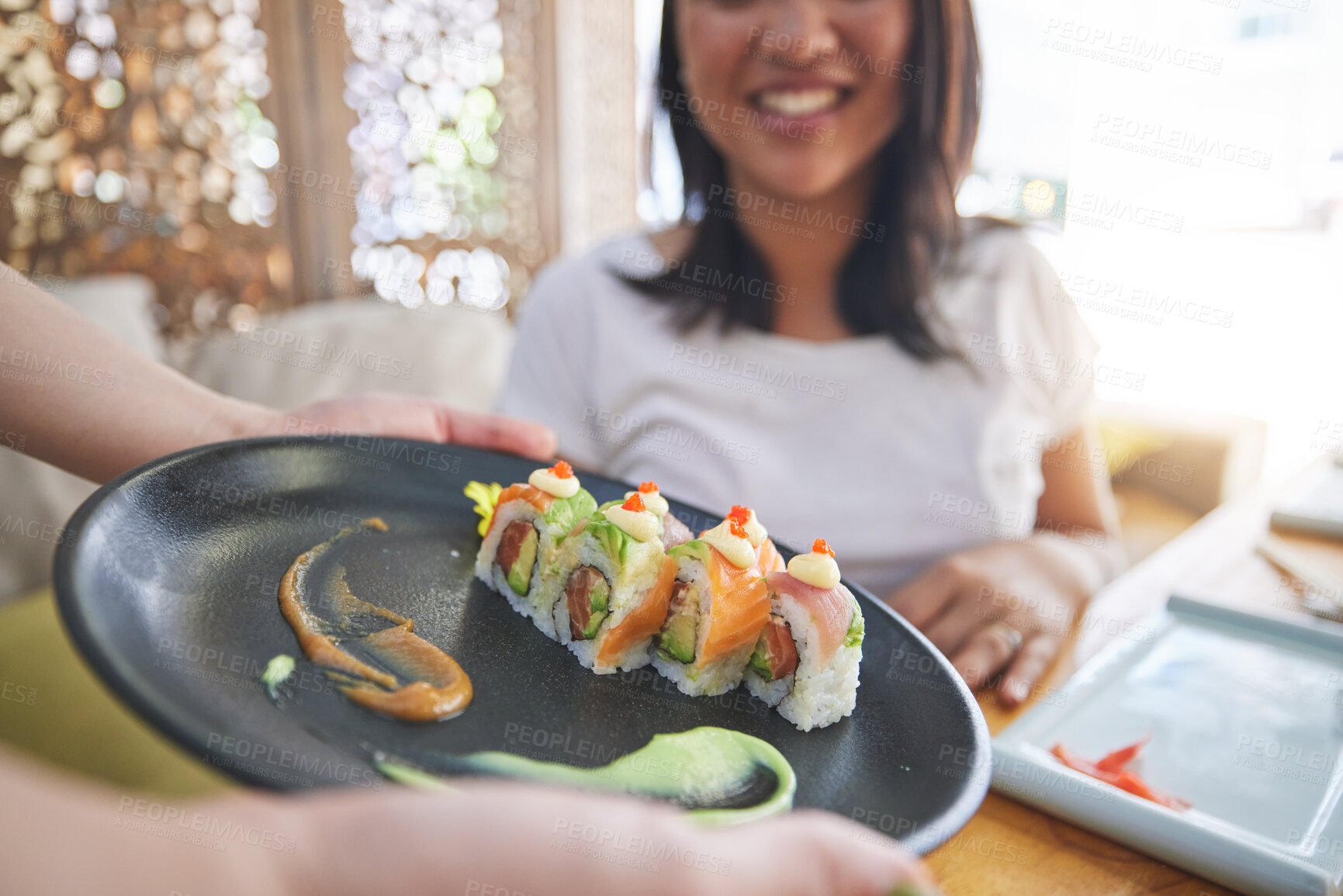 Buy stock photo Sushi plate, restaurant and hands of person, server or waiter with food choice, order or lunch for diner service. Hospitality industry, Japanese cuisine and cafeteria worker with meal for customer