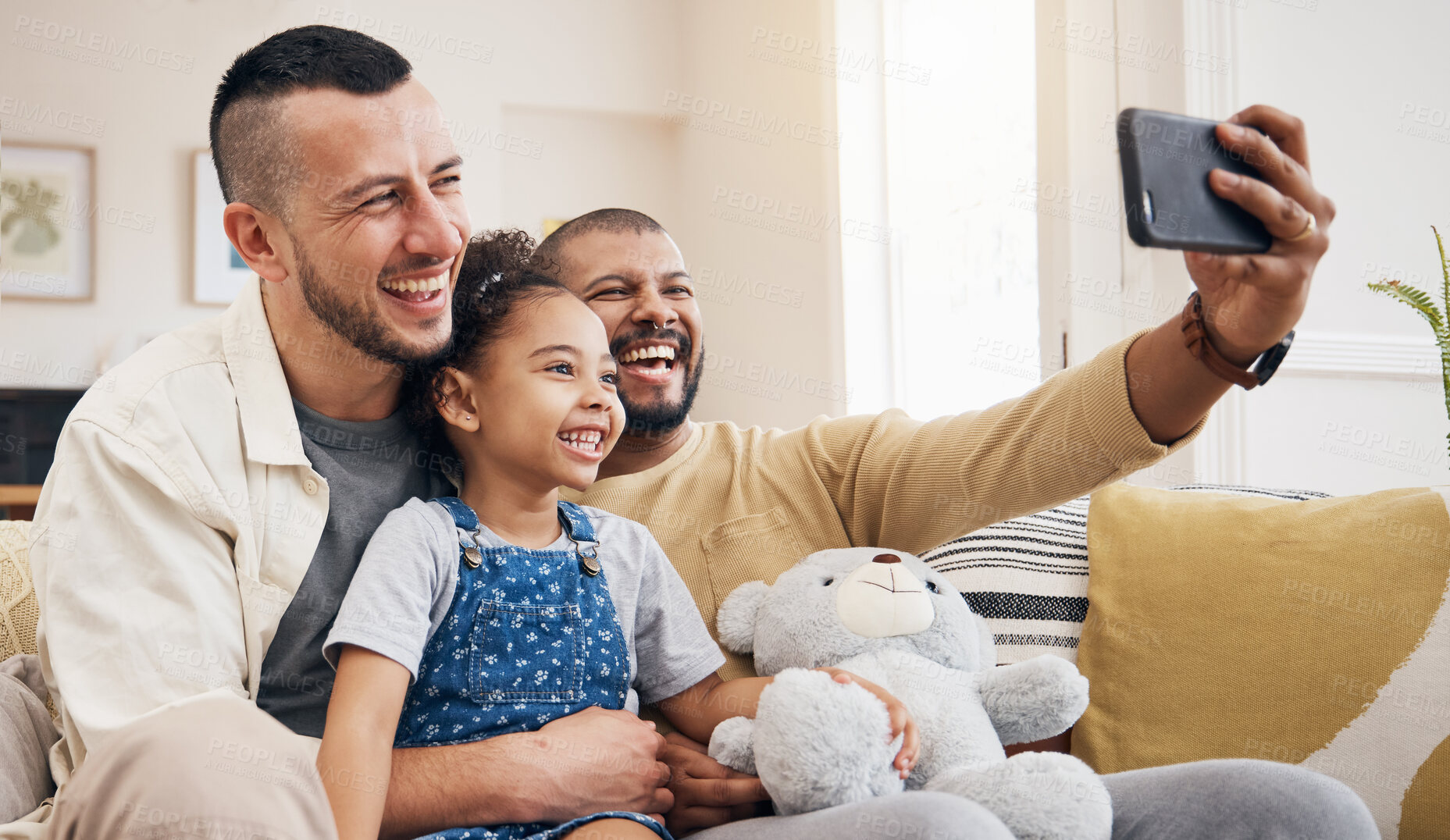 Buy stock photo Gay family, selfie and child on home sofa for video call, social media and internet. Lgbt men or parents with kid together on a couch for streaming, profile picture and adoption memory with happiness