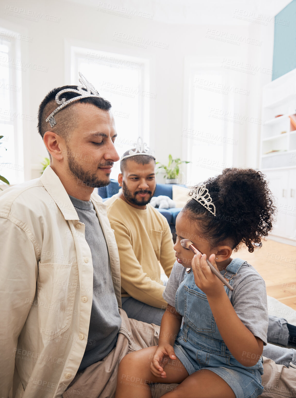 Buy stock photo Blended family, LGBT parents and makeup with a girl in the living room of her home for princess fantasy. Gay, love or adoption and a daughter together with her father on the sofa for bonding closeup