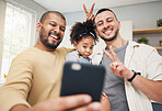 Selfie, blended family and a happy girl with her lgbt parents in the kitchen together for a profile picture. Adoption photograph, smile or love and a playful daughter with her gay father in the home