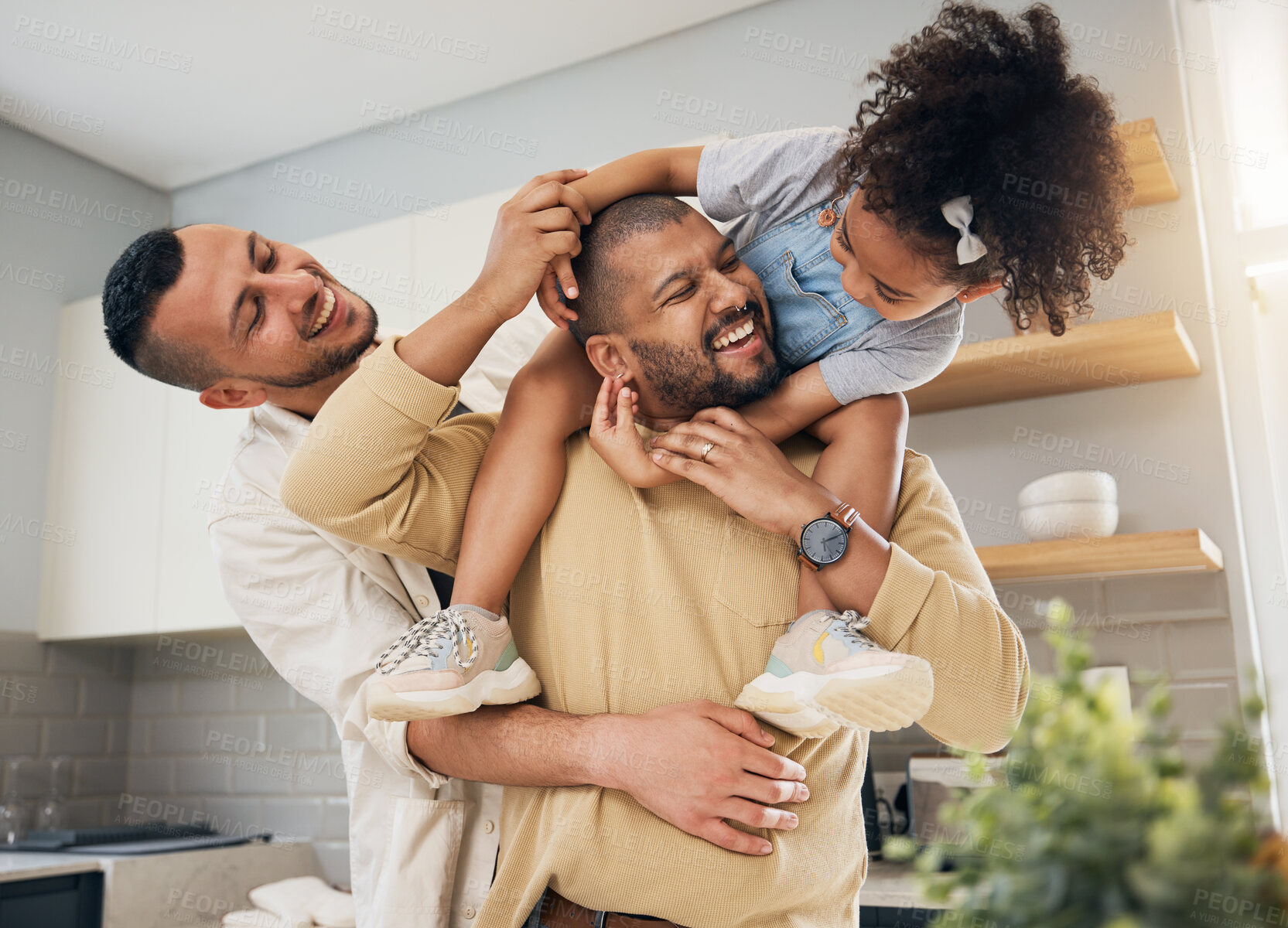 Buy stock photo Happy family, gay parents and playing with child in home together with love, support and bonding with girl on shoulders LGBT, fathers and men with happiness, smile and dads in kitchen with kid