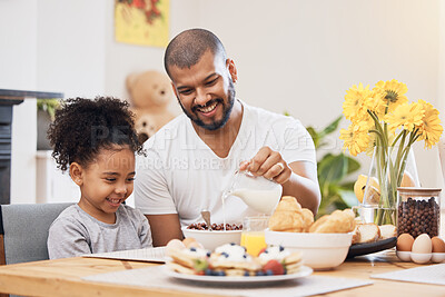 Buy stock photo Home, breakfast and father with girl, cereal and help with milk, nutrition and family with food. Male parent, child and kid with healthy meal, start the day and dad with support, hungry and happy