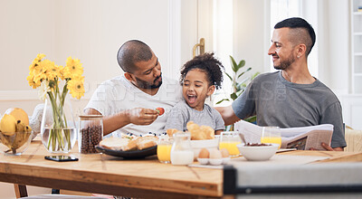 Buy stock photo Gay couple, breakfast and parents feeding kid meal, food or strawberry for morning wellness, nutrition and development support. Healthy family, home fruit and homosexual father smile for hungry child