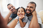 Gay, family and selfie portrait of child in home bedroom, bonding and fun together. Face of men, lgbtq parents and girl on bed in adoption, foster and profile picture, happy memory and interracial