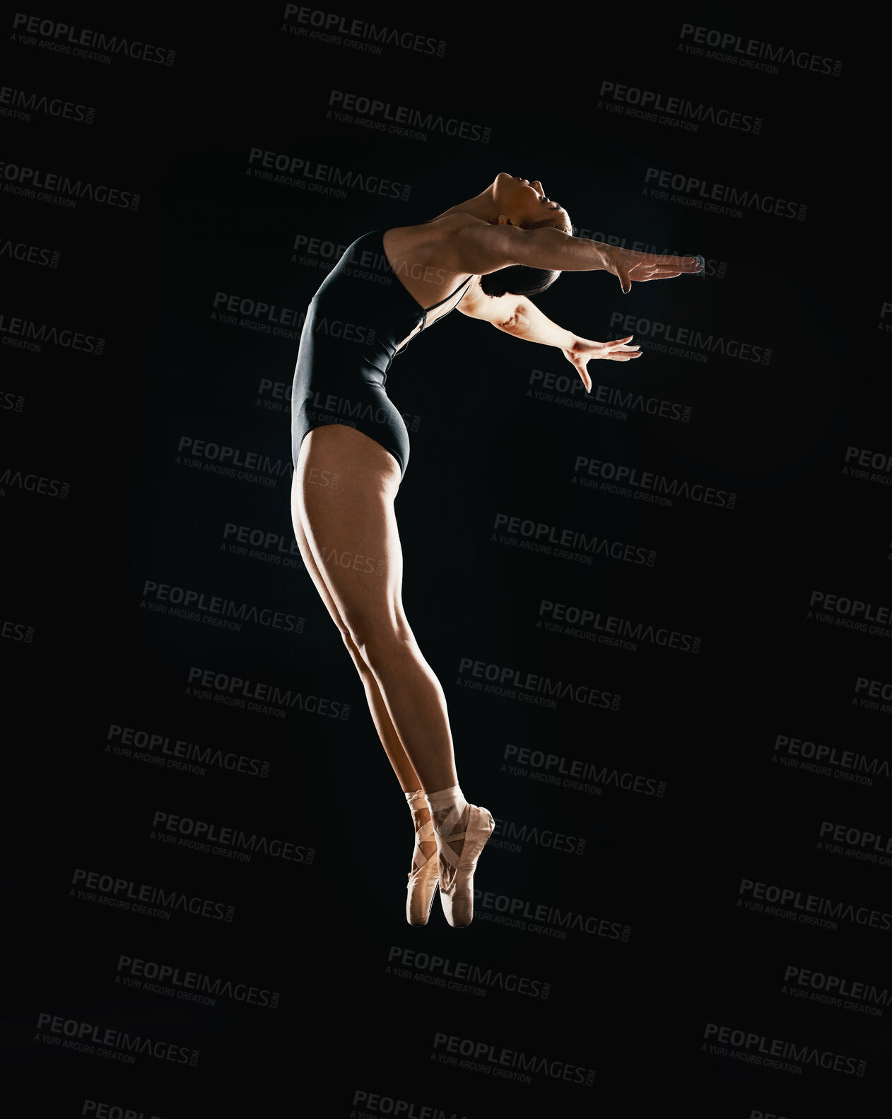 Buy stock photo Art, ballet jumping and woman on black background in dance performance with balance, action and talent. Dark aesthetic, flexible ballerina or dancer training with fitness, creativity and studio show.