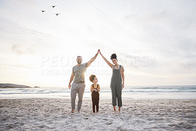 Buy stock photo Family, high five and beach for travel, celebration and freedom, bond or fun in nature together. Love, hands together and girl child with parents at sea playing, relax and happy on holiday in Bali
