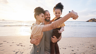 Buy stock photo Happy family, selfie and together on beach, vacation or memory of tropical island, holiday in Bali and bonding in summer. Ocean, sunset and parents with child in hug with love, care and support