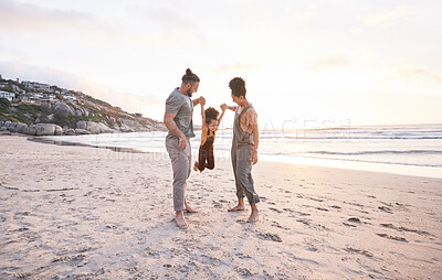 Buy stock photo Sunset, swing and holding hands with family at beach for bonding, summer vacation and travel. Smile, happy and relax with parents and child walking on seaside holiday for love, freedom and support