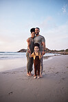 Portrait, family and smile at beach, holding hands and sunset, bonding or outdoor on mockup space. Face, happy and father, kid and mother at ocean in interracial, summer holiday or vacation to travel