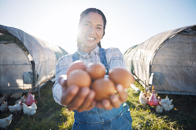 Buy stock photo Woman with eggs, smile and chickens on farm with grass, sunshine and countryside field with sustainable business. Agriculture, poultry farming and farmer holding produce for food, nature and animals.