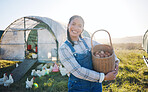 Happy woman with eggs in basket, farm and chickens on grass in sunshine countryside field with sustainable business. Agriculture, poultry farming and farmer holding produce for food, nature and birds