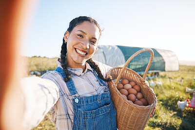 Buy stock photo Farm, harvest and woman in selfie with basket, eggs and working with chicken, product and sustainability in agriculture business. Female farmer and field in countryside, spring farming and egg photo