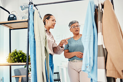 Buy stock photo Consulting, fashion and shopping with customer in shop for advice on fabric or products on promotion. Stylist, store or mature woman talking in boutique mall for clothes deal, help or discount offer