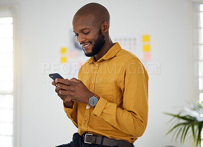 Buy stock photo Business, black man and typing on smartphone in office for social network, mobile website and internet contact. Happy worker scroll on cellphone chat, reading news app and notification of information