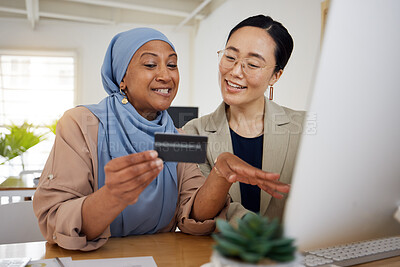 Buy stock photo Online shopping, credit card and business women or friends doing ecommerce or banking while talking together. Muslim, asian and professional consulting a customer on rewards purchase on website