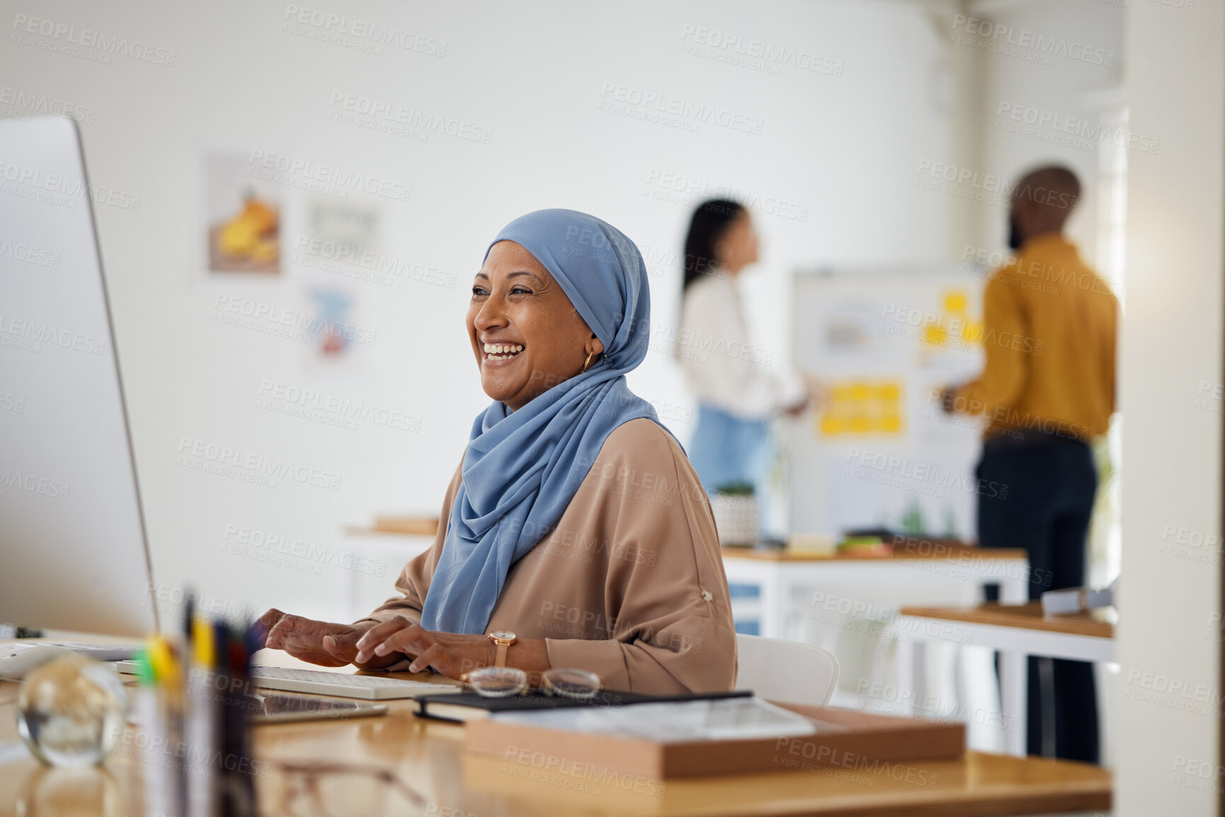 Buy stock photo Smile, email and a Muslim woman in an office with a computer for communication or connection. Happy, business and an Islamic employee in a workspace with a pc for internet, typing or website