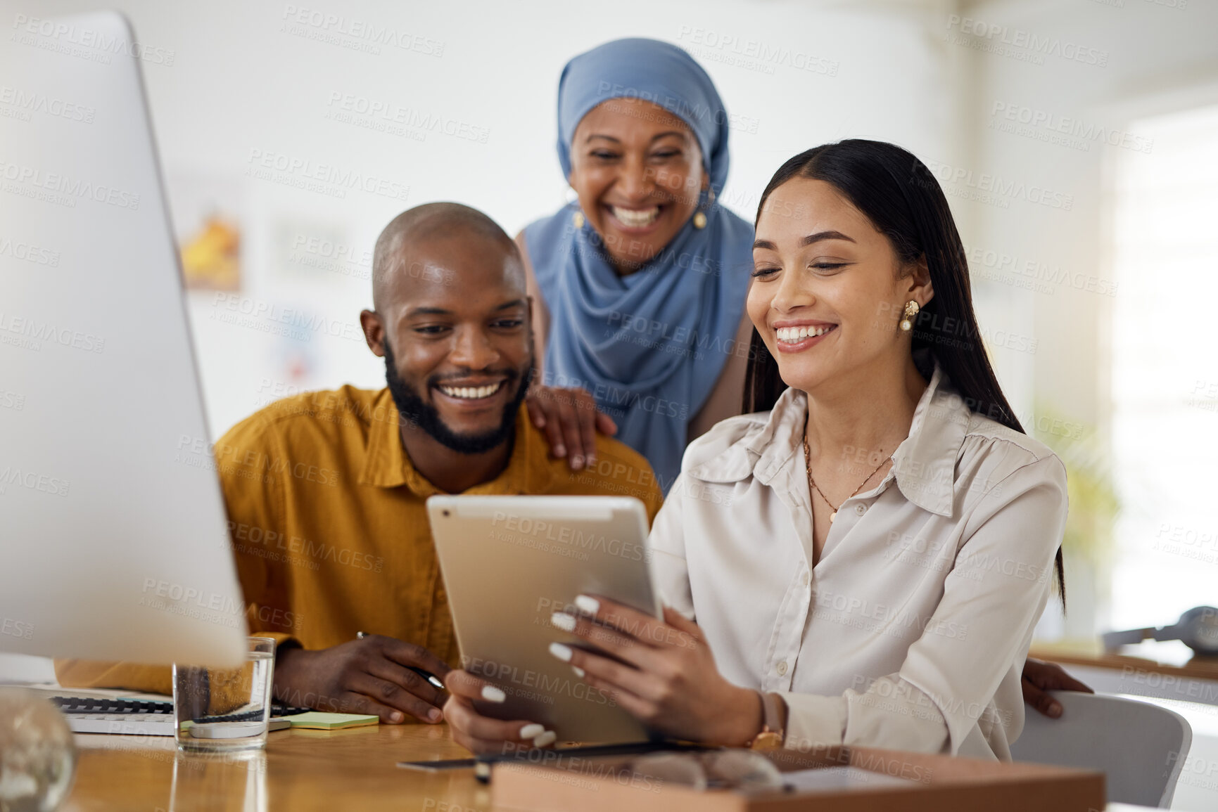 Buy stock photo Happy creative people, tablet and meeting in teamwork, online collaboration or research at office. Group of employees smile on technology in communication or networking for startup at the workplace