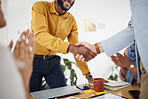 Creative people, handshake and meeting in hiring, b2b or partnership and applause in teamwork at office. Happy employees shaking hands in team recruiting, agreement or deal in startup at workplace