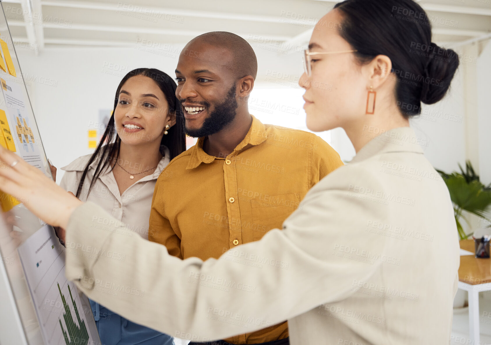 Buy stock photo Whiteboard, teamwork and business people planning in office brainstorming for creative project. Collaboration, analysis and young designers reading ideas or information for strategy in the workplace.