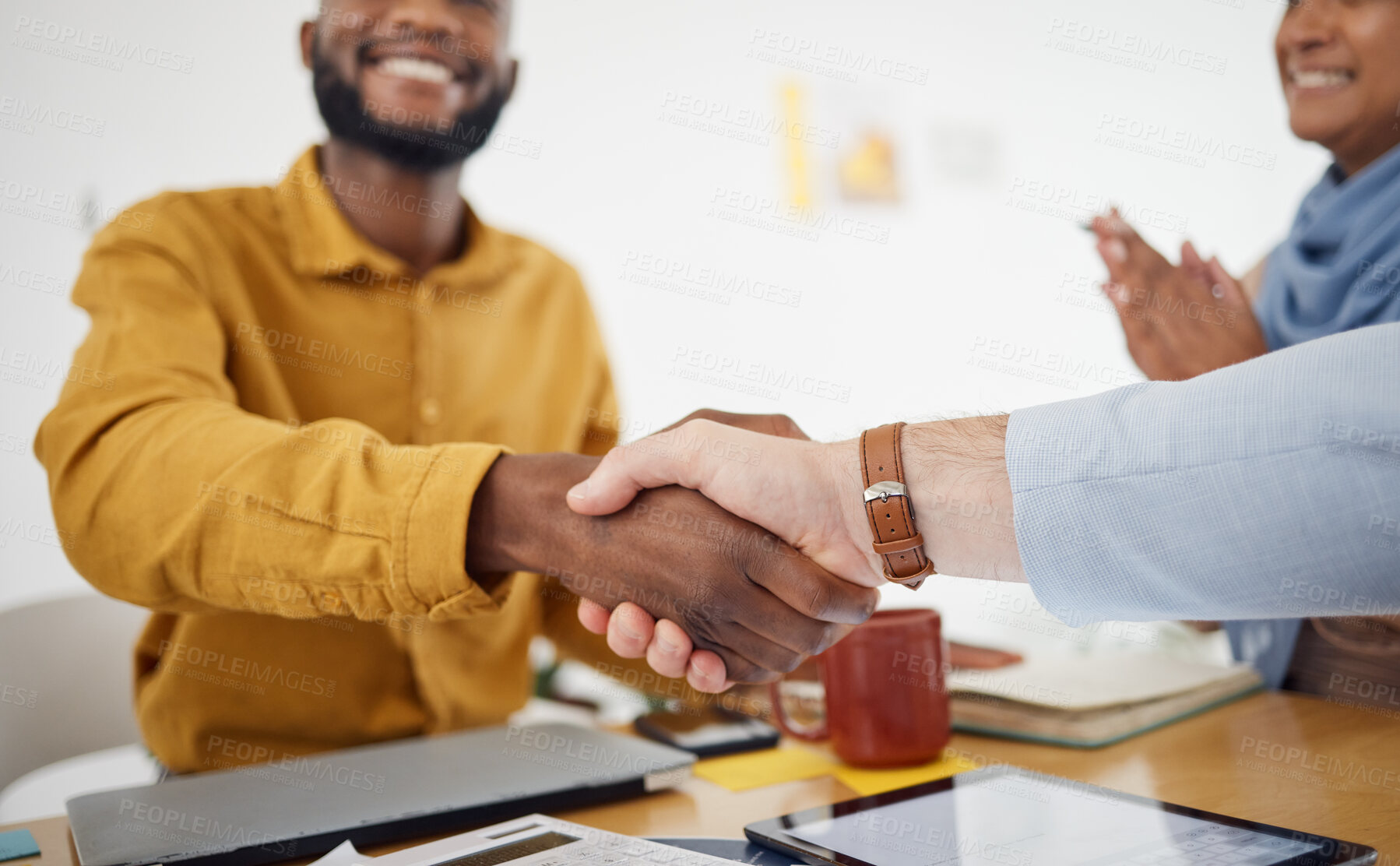 Buy stock photo Creative people, handshake and meeting in celebration, promotion or partnership in teamwork at office. Happy employees shaking hands in team recruiting, agreement or deal in startup at the workplace