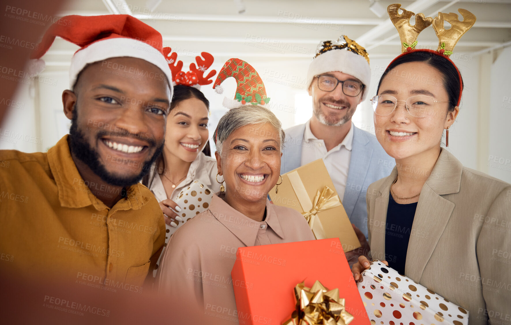 Buy stock photo Business people, Christmas selfie and group with smile, present or portrait for celebration, diversity or party. Men, women and photography for xmas memory, friends and gift box for workplace culture