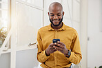 Business, happy black man and typing with phone in office for social network, mobile website and internet contact. Employee scroll on smartphone chat, reading news app and notification of information